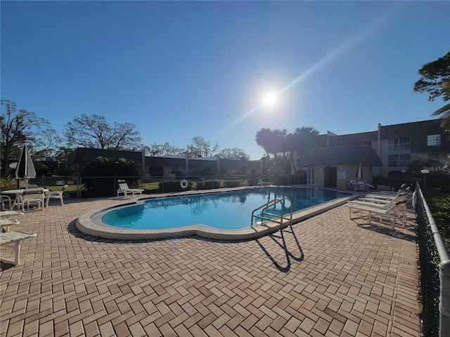 view of pool with a patio area