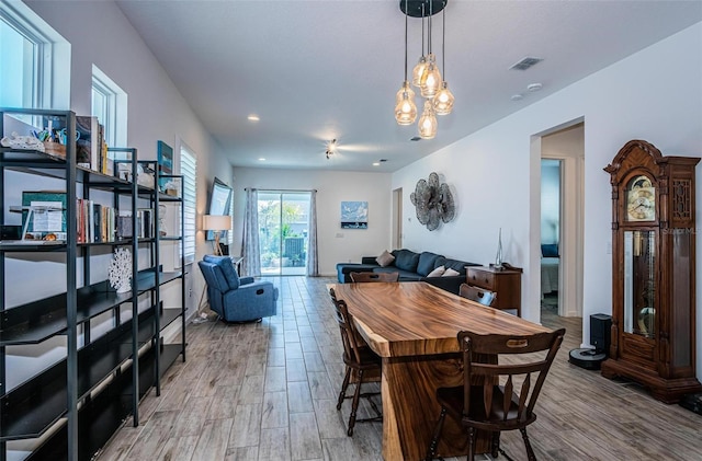811 Winterside Dr, Apollo Beach, FL 33572 - dining area with wood finished floors, recessed lighting, and a chandelier
