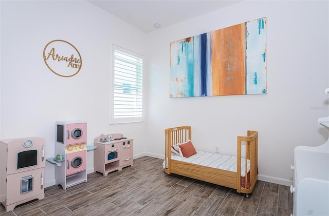 811 Winterside Dr, Apollo Beach, FL 33572 - bedroom featuring wood finish floors and baseboards