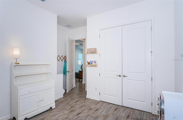 811 Winterside Dr, Apollo Beach, FL 33572 - bedroom featuring a closet and light wood-type flooring