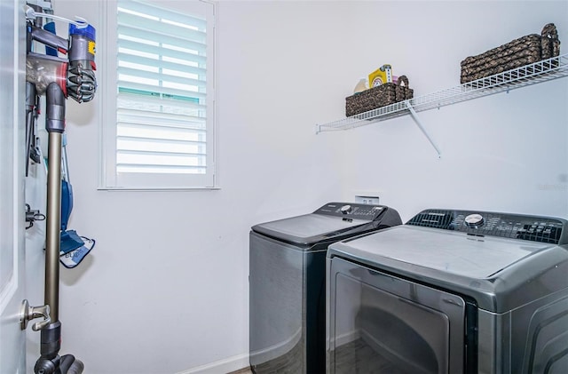 811 Winterside Dr, Apollo Beach, FL 33572 - laundry room with separate washer and dryer and baseboards