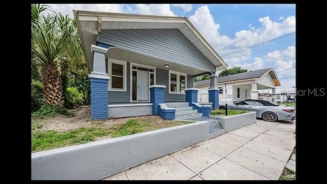 bungalow-style house featuring covered porch