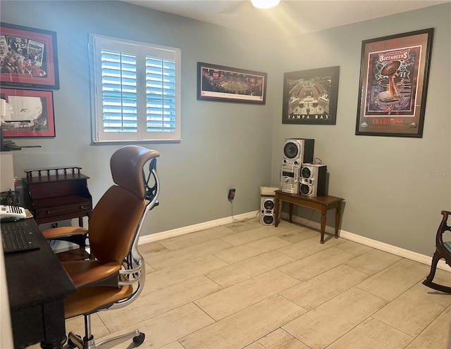 office with light hardwood / wood-style floors