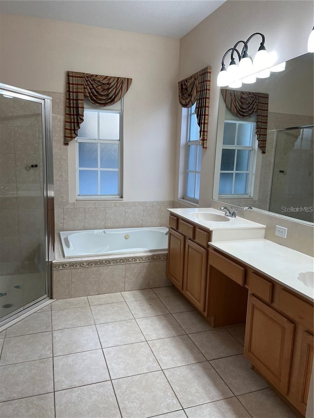 bathroom with vanity, shower with separate bathtub, and tile patterned flooring