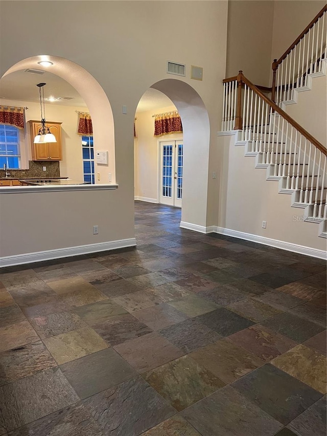 interior space featuring a high ceiling