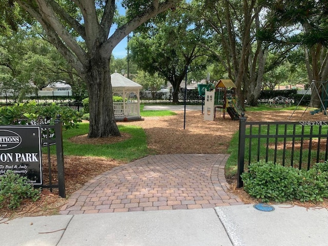 view of property's community featuring a gazebo and a playground