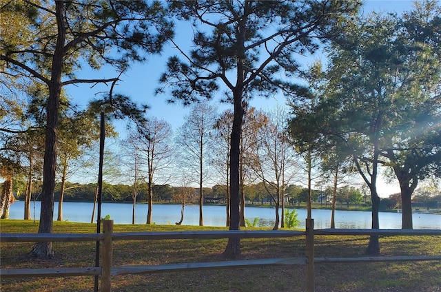 view of water feature featuring fence