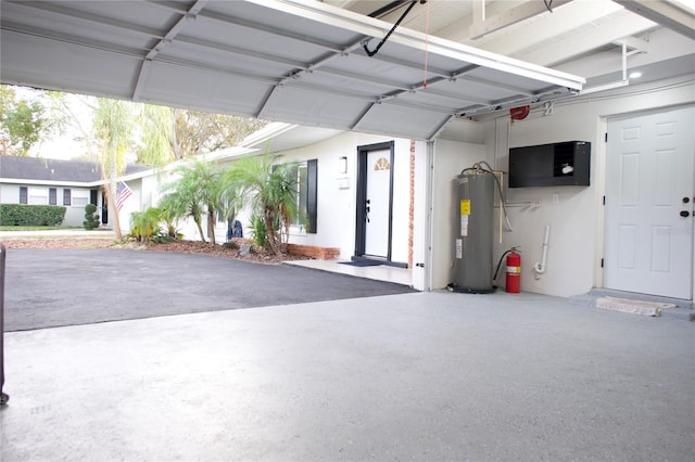 garage featuring water heater