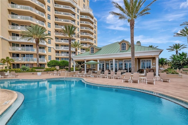 view of pool with a patio area