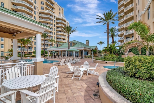 view of patio / terrace featuring a community pool