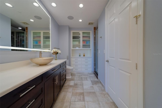 full bath with toilet, recessed lighting, visible vents, and vanity