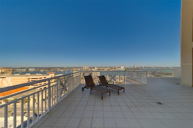 view of patio featuring a balcony