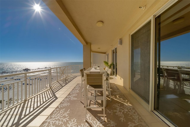 balcony featuring a water view