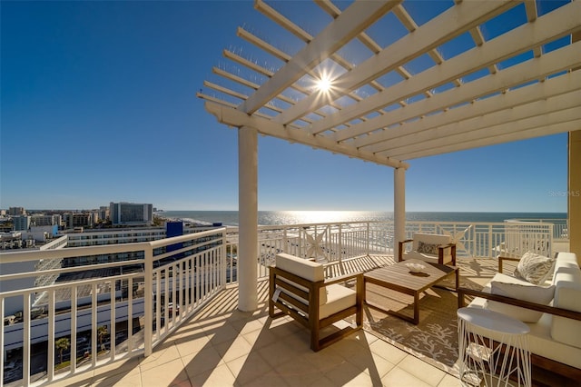 view of patio / terrace with an outdoor hangout area, central AC, a water view, and a pergola