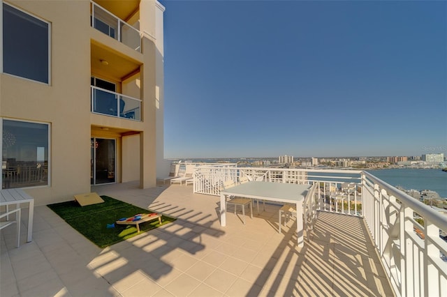 view of patio featuring a water view