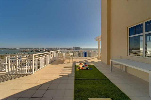 view of patio / terrace featuring a water view