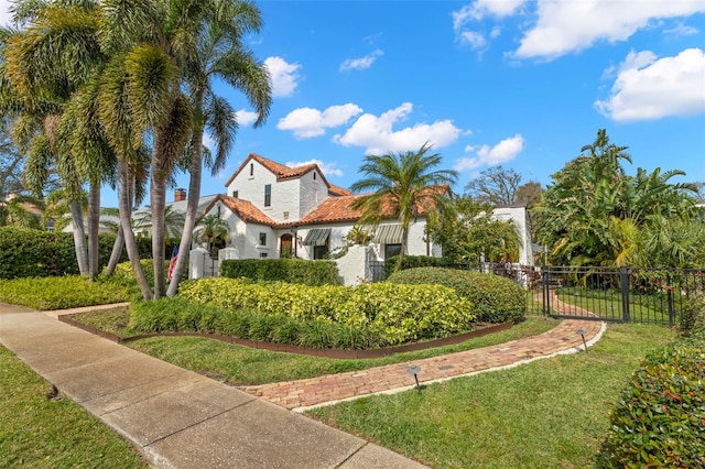 view of front of home featuring a front lawn