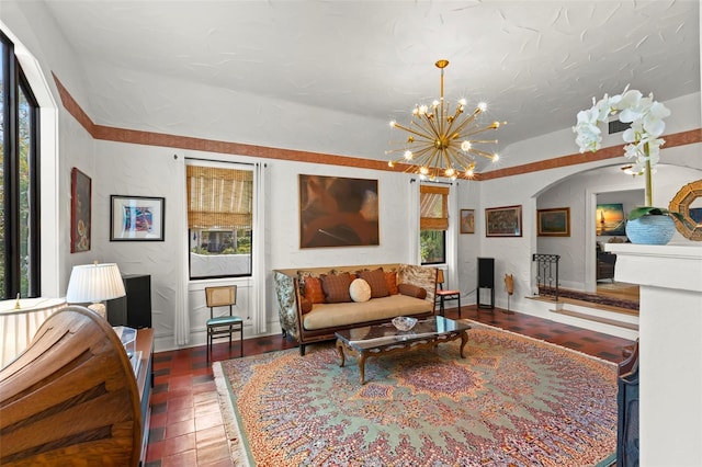 living room featuring an inviting chandelier