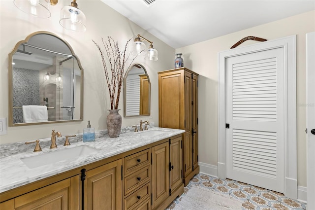 bathroom with vanity and an enclosed shower