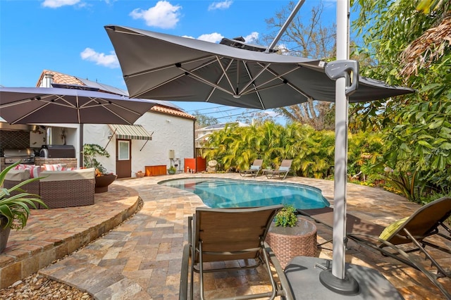 view of swimming pool with an outdoor hangout area, grilling area, and a patio