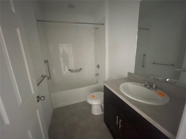 full bathroom featuring tile patterned floors, toilet, shower / bathing tub combination, and vanity