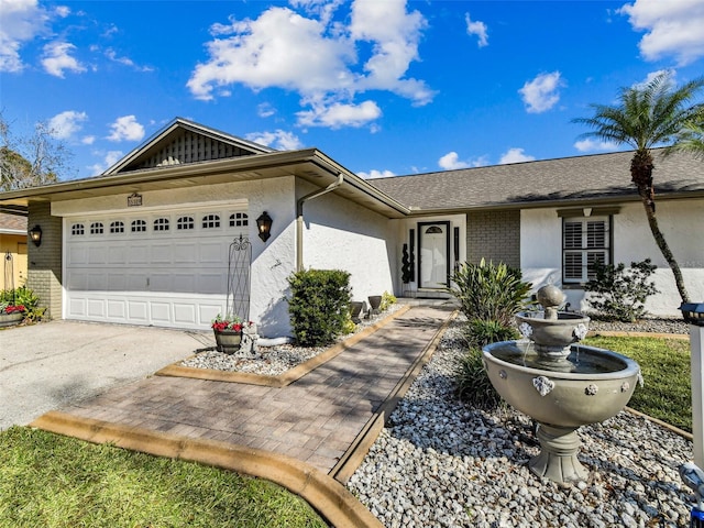 ranch-style house featuring a garage