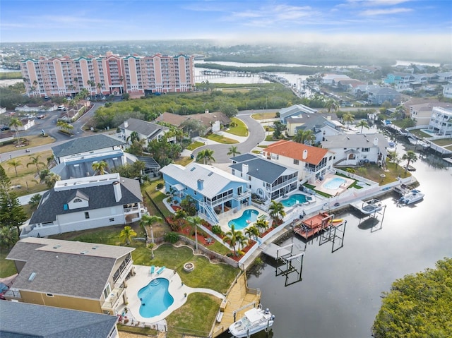 drone / aerial view featuring a water view