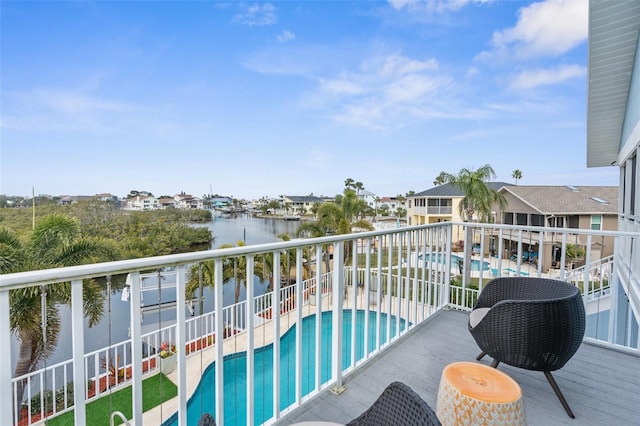 balcony featuring a water view