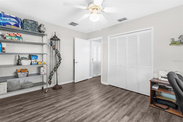 office area featuring ceiling fan and dark hardwood / wood-style flooring