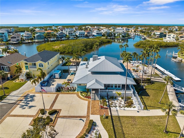 drone / aerial view with a water view