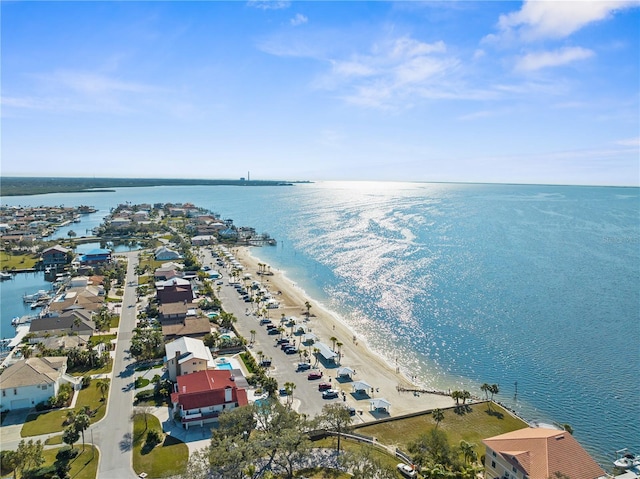 aerial view with a beach view and a water view