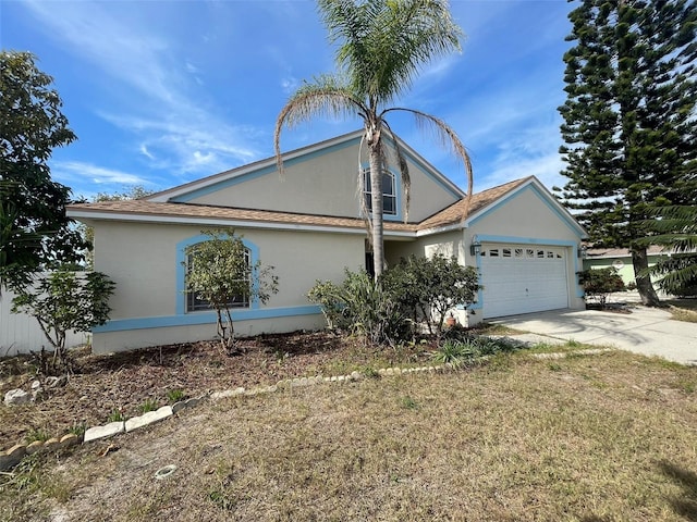 view of property exterior with a yard and a garage