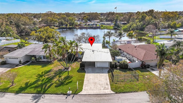 bird's eye view with a residential view and a water view