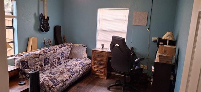 home office with dark wood-type flooring