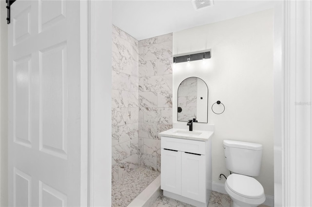 full bath with visible vents, toilet, tiled shower, marble finish floor, and vanity