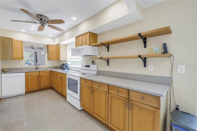 kitchen with recessed lighting, white appliances, a sink, light countertops, and open shelves