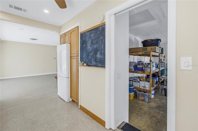 hall featuring recessed lighting, visible vents, and baseboards