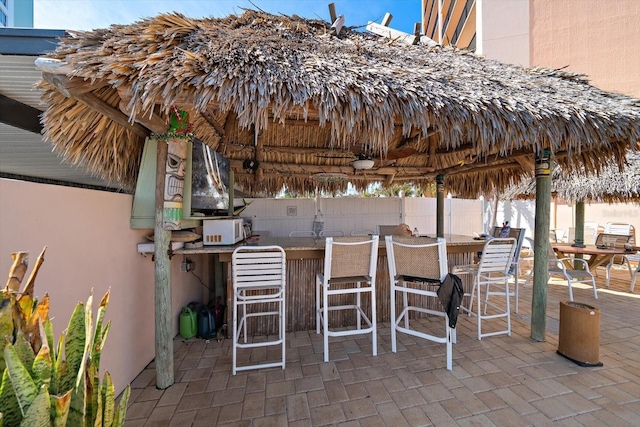 view of patio / terrace with an outdoor bar