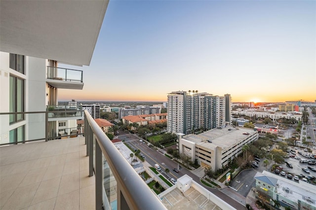 view of balcony at dusk