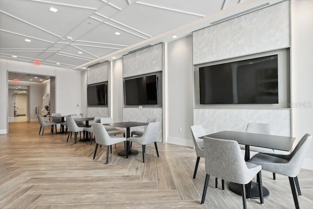 dining area featuring light parquet flooring