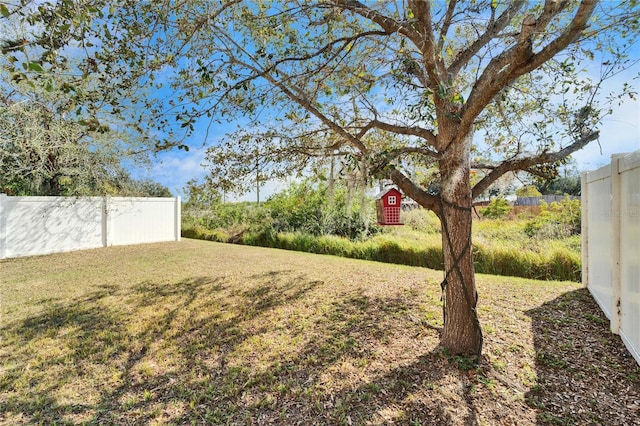 view of yard with fence