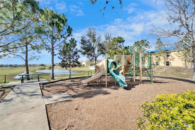 community playground with a water view