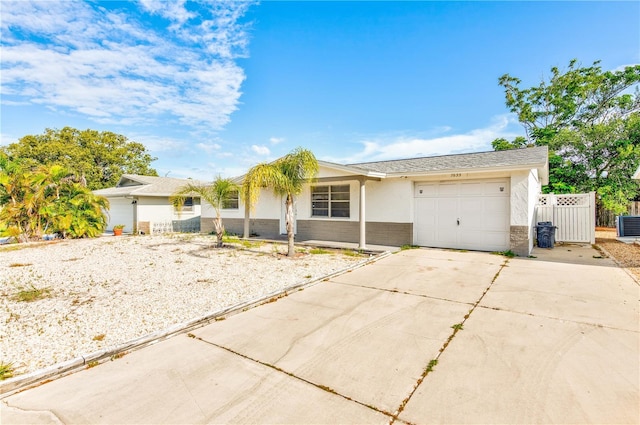 single story home featuring a garage