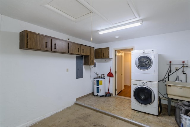 laundry area with stacked washer and dryer, electric water heater, sink, and electric panel