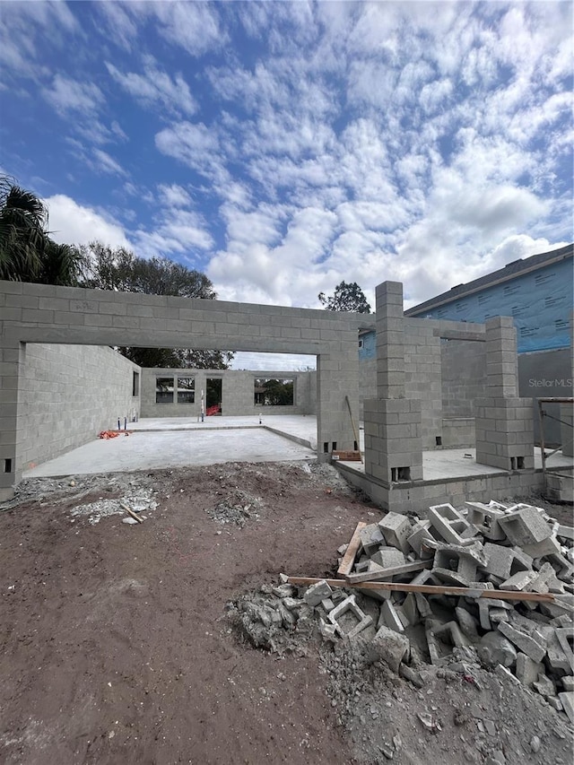 rear view of house with a patio