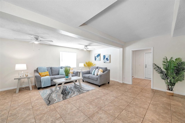 tiled living room with ceiling fan and a textured ceiling