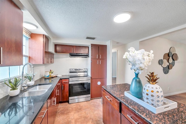 kitchen with sink, a textured ceiling, electric range, dark stone counters, and backsplash