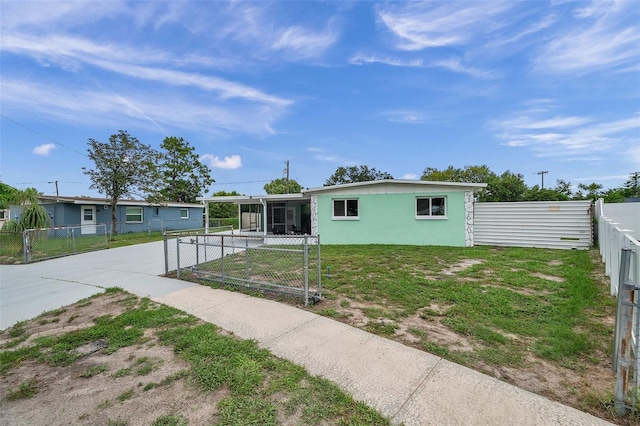 view of front of property with a front lawn