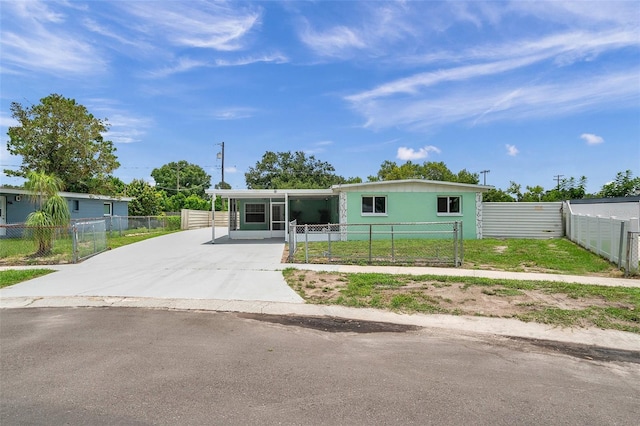 manufactured / mobile home featuring a carport