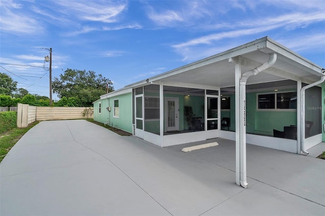 back of property featuring a patio area